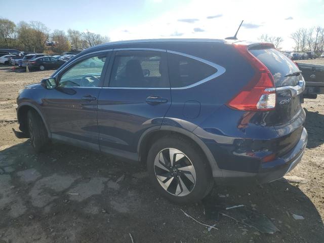 Photo 2 from auction – 2016 HONDA CR-V TOURI with VIN 5J6RM4H98GL103739