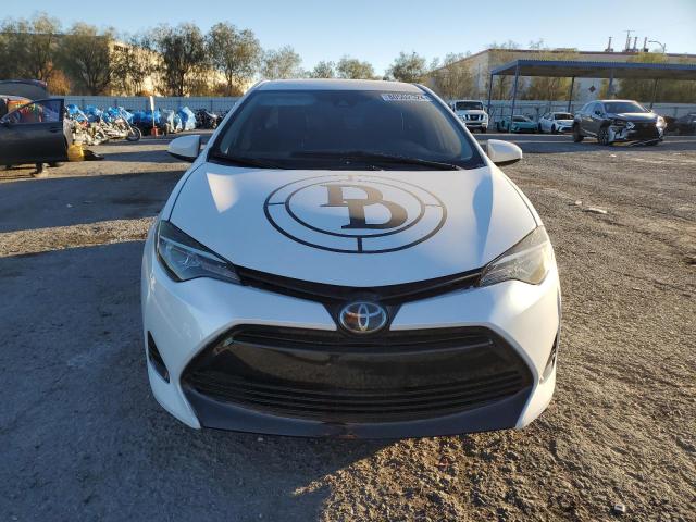 Photo 5 from auction – 2017 TOYOTA COROLLA L with VIN 5YFBURHE4HP737396