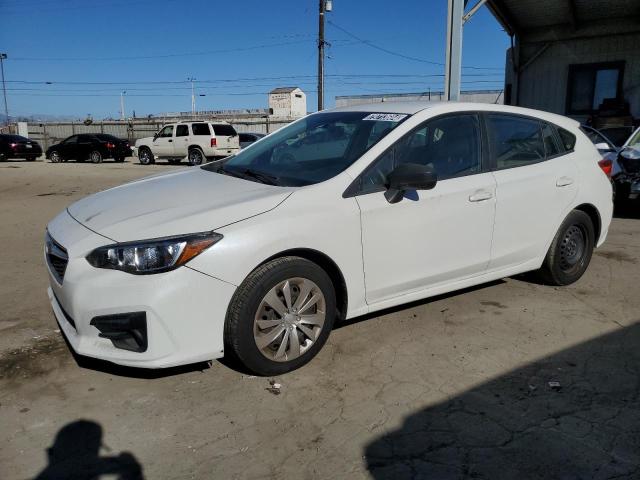 SUBARU IMPREZA 2019 with VIN 4S3GTAA65K3700628 - Photo from auction