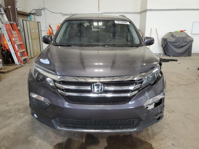 Photo 5 from auction – 2018 HONDA PILOT TOUR with VIN 5FNYF6H99JB504203
