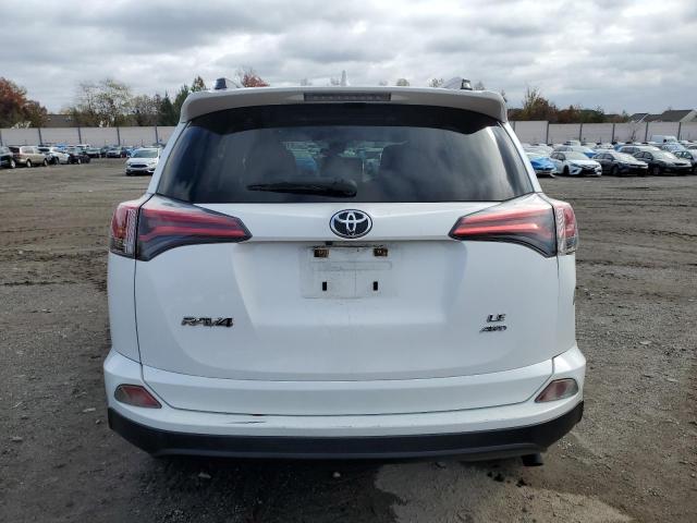 Photo 6 from auction – 2017 TOYOTA RAV4 LE with VIN JTMBFREV5HJ134668