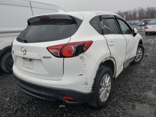 Photo 3 from auction – 2013 MAZDA CX-5 TOURI with VIN JM3KE4CE1D0118354