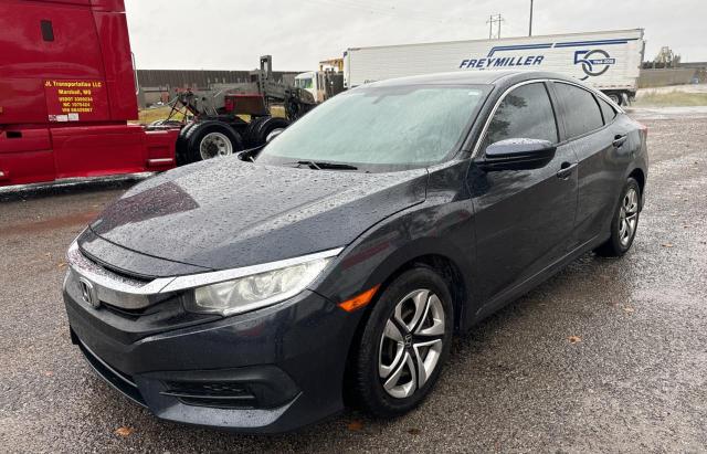 Photo 2 from auction – 2017 HONDA CIVIC LX with VIN 19XFC2F57HE024640
