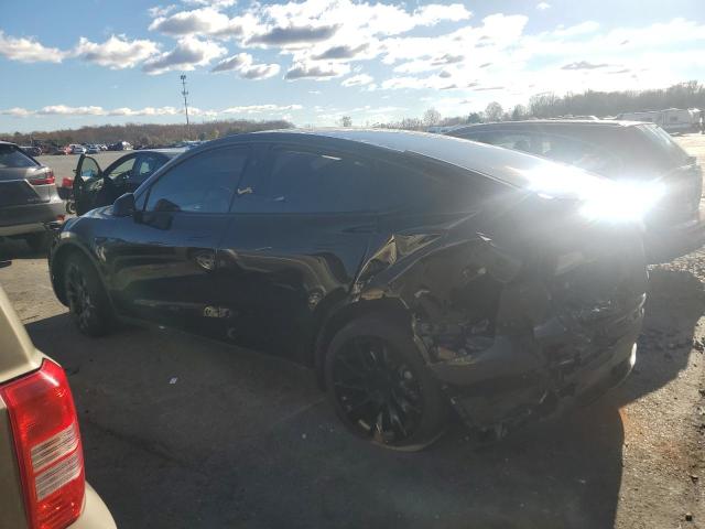 Photo 2 from auction – 2023 TESLA MODEL Y with VIN 7SAYGDEE1PF850759