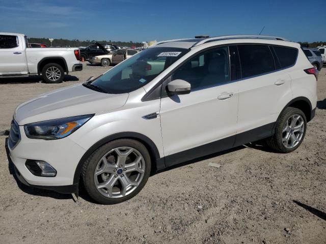 FORD ESCAPE TIT 2017 with VIN 1FMCU0J92HUB88616 - Photo from auction