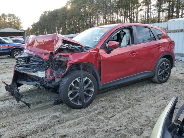 MAZDA CX-5 GT 2016 with VIN JM3KE4DY9G0739497 - Photo from auction