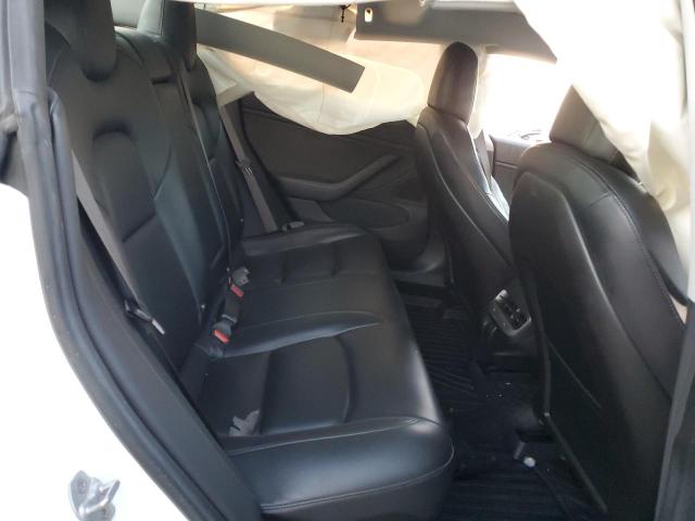 Снимка 10 от търг – 2018 TESLA MODEL 3 с VIN 5YJ3E1EA2JF049175