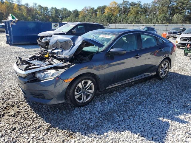 HONDA CIVIC LX 2017 with VIN 19XFC2F59HE039978 - Photo from auction