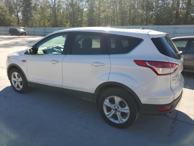 Photo 2 from auction – 2016 FORD ESCAPE SE with VIN 1FMCU9GX4GUB82955