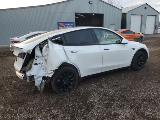 Photo 3 from auction – 2022 TESLA MODEL Y with VIN 7SAYGAEE3NF514817