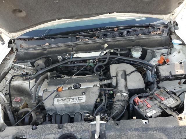 Photo 12 from auction – 2004 HONDA CR-V LX with VIN JHLRD68424C011577