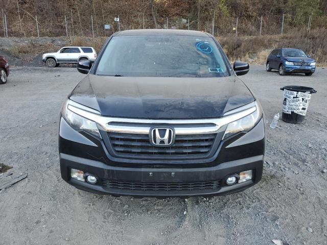 Photo 5 from auction – 2017 HONDA RIDGELINE with VIN 5FPYK3F58HB014234