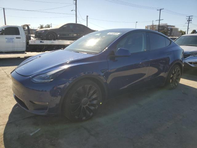 TESLA MODEL Y 2022 with VIN 7SAYGDEF8NF328071 - Photo from auction