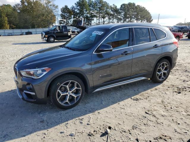 BMW X1 XDRIVE2 2016 with VIN WBXHT3C33GP882254 - Photo from auction