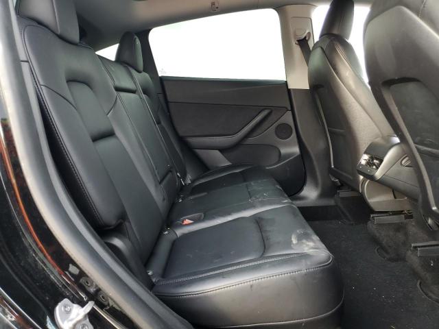 Photo 11 from auction – 2021 TESLA MODEL Y with VIN 5YJYGDEE0MF255412