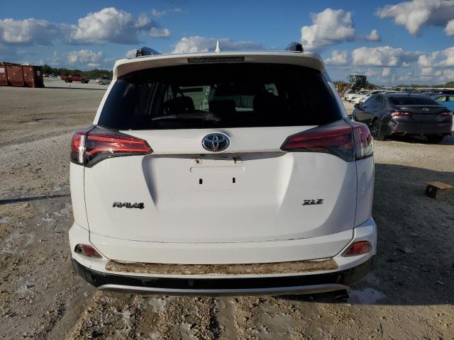 Photo 6 from auction – 2017 TOYOTA RAV4 XLE with VIN 2T3WFREV1HW333042