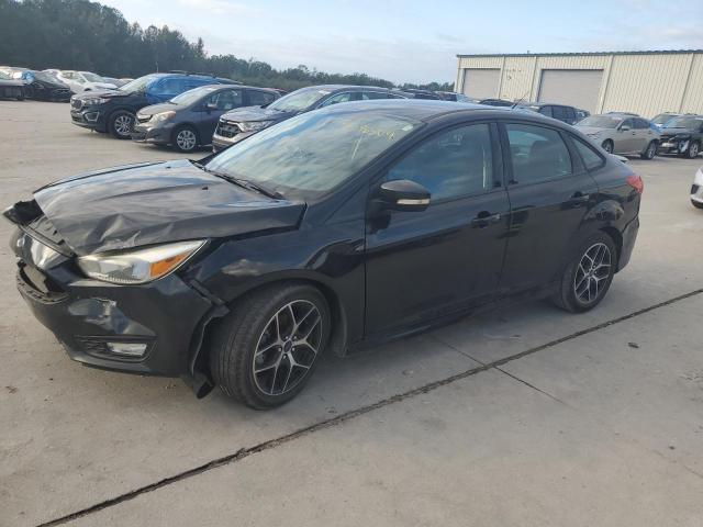 FORD FOCUS SE 2015 with VIN 1FADP3F26FL311369 - Photo from auction