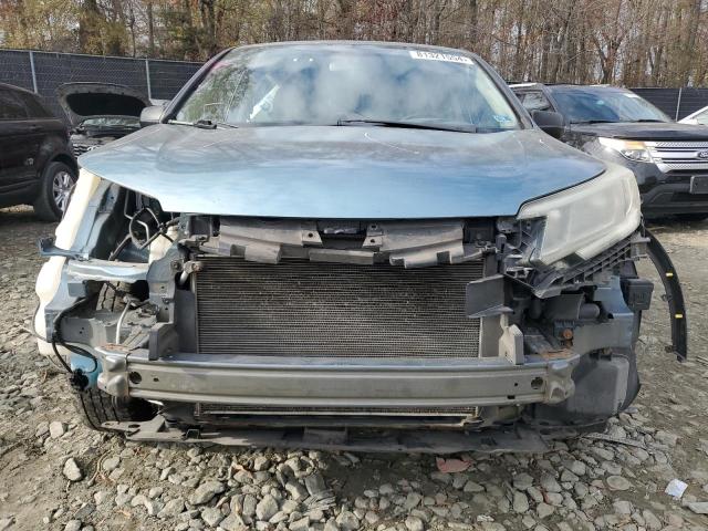 Photo 5 from auction – 2015 HONDA CR-V LX with VIN 5J6RM4H37FL080562
