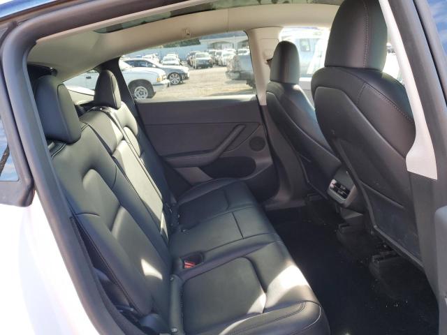 Photo 11 from auction – 2023 TESLA MODEL Y with VIN 7SAYGDEE2PF834070