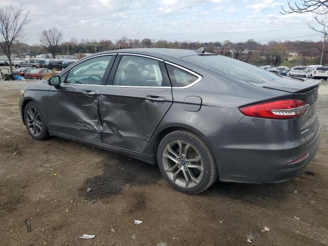 Photo 2 from auction – 2020 FORD FUSION TIT with VIN 3FA6P0RUXLR129899