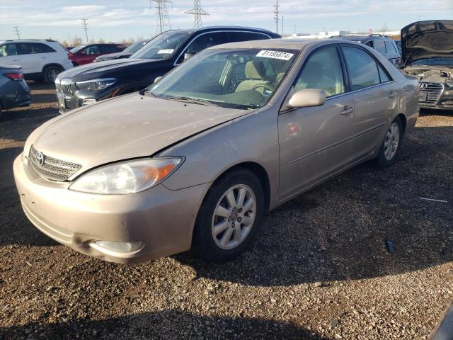 TOYOTA CAMRY LE 2003 with VIN 4T1BE32KX3U759998 - Photo from auction