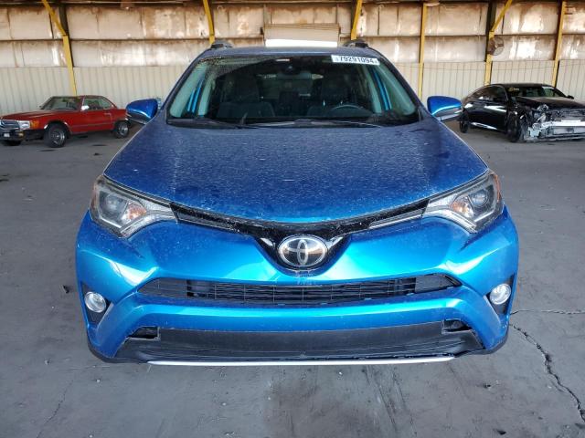 Photo 5 from auction – 2017 TOYOTA RAV4 XLE with VIN 2T3WFREV5HW385693