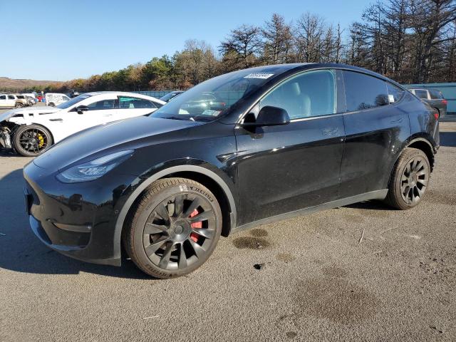 TESLA MODEL Y 2022 with VIN 7SAYGDEE2NF342216 - Photo from auction