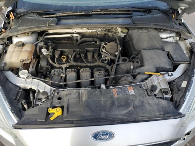 Photo 11 from auction – 2015 FORD FOCUS S with VIN 1FADP3E25FL314104