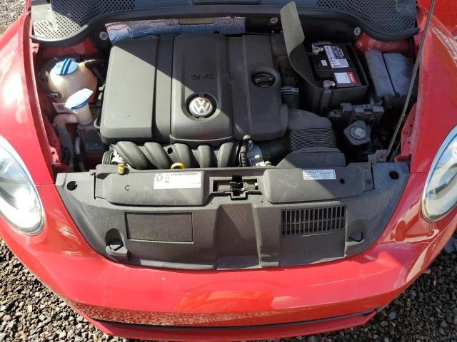Photo 11 from auction – 2014 VOLKSWAGEN BEETLE with VIN 3VW5P7AT1EM802142