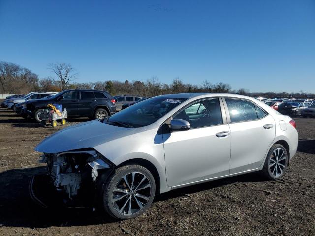 TOYOTA COROLLA L 2018 with VIN 5YFBURHEXJP809112 - Photo from auction