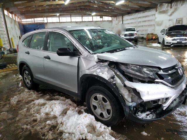 Photo 4 from auction – 2015 HONDA CR-V LX with VIN 2HKRM4H31FH698874