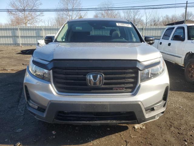 Photo 5 from auction – 2023 HONDA RIDGELINE with VIN 5FPYK3F10PB054271