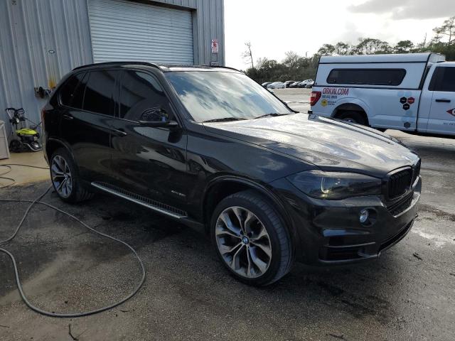 Photo 4 from auction – 2014 BMW X5 XDRIVE5 with VIN 5UXKR6C59E0C03809
