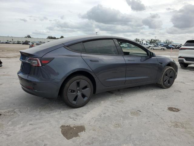 Photo 3 from auction – 2023 TESLA MODEL 3 with VIN 5YJ3E1EA5PF614799