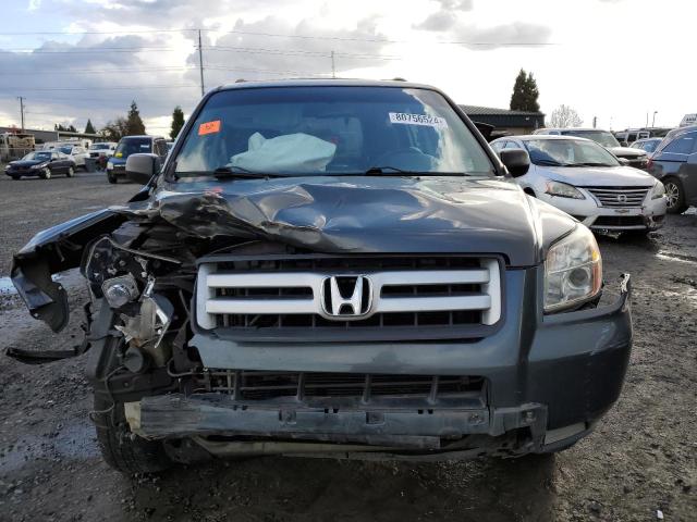 Photo 5 from auction – 2006 HONDA PILOT LX with VIN 2HKYF18106H520151
