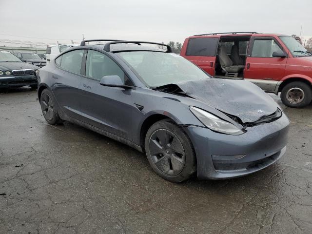 Photo 4 from auction – 2022 TESLA MODEL 3 with VIN 5YJ3E1EB7NF107442
