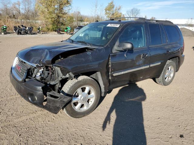 GMC ENVOY 2005 with VIN 1GKDT13S752297313 - Photo from auction