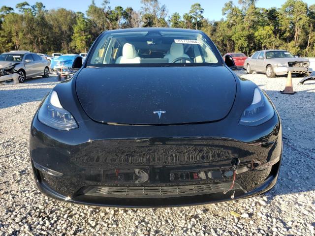 Photo 5 from auction – 2024 TESLA MODEL Y with VIN 7SAYGDED2RF162151