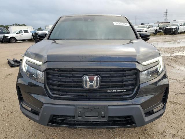 Photo 5 from auction – 2022 HONDA RIDGELINE with VIN 5FPYK3F83NB016964