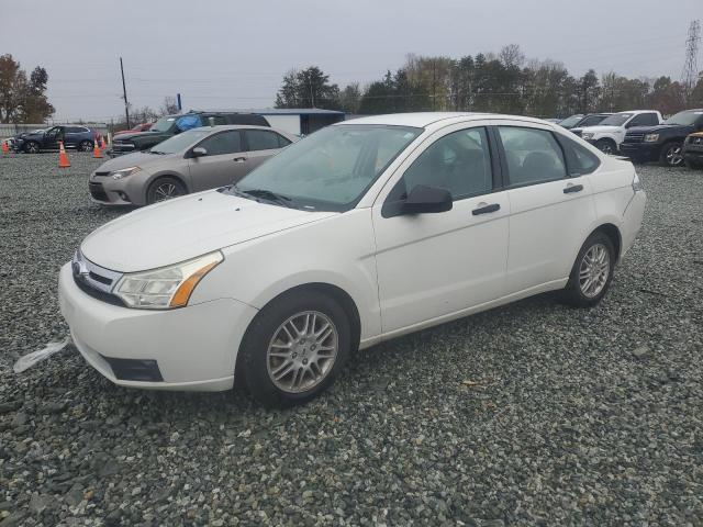 FORD FOCUS SE 2010 with VIN 1FAHP3FNXAW285653 - Photo from auction