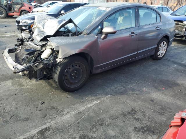 HONDA CIVIC LX 2011 with VIN 2HGFA1F51BH545785 - Photo from auction