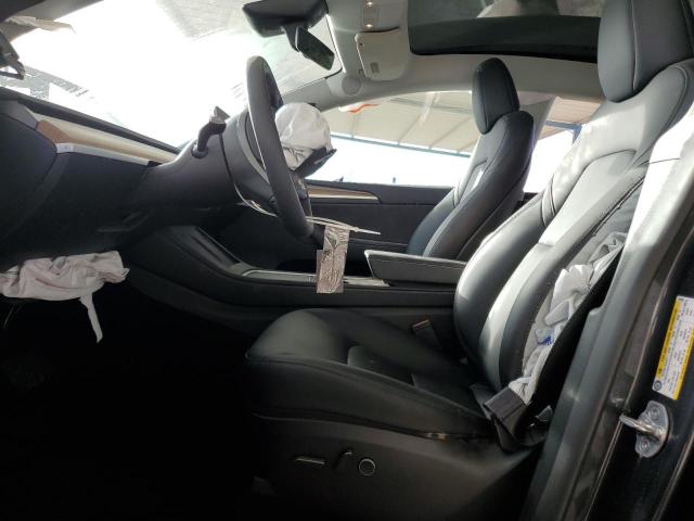 Photo 7 from auction – 2024 TESLA MODEL Y with VIN 7SAYGDEE0RA301201
