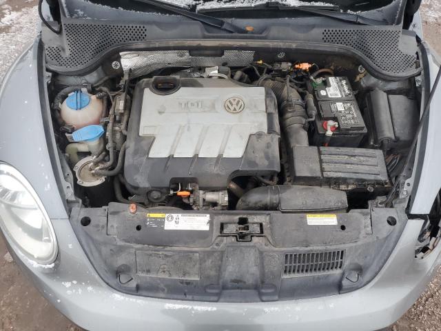 Photo 11 from auction – 2013 VOLKSWAGEN BEETLE with VIN 3VWJL7AT7DM662171