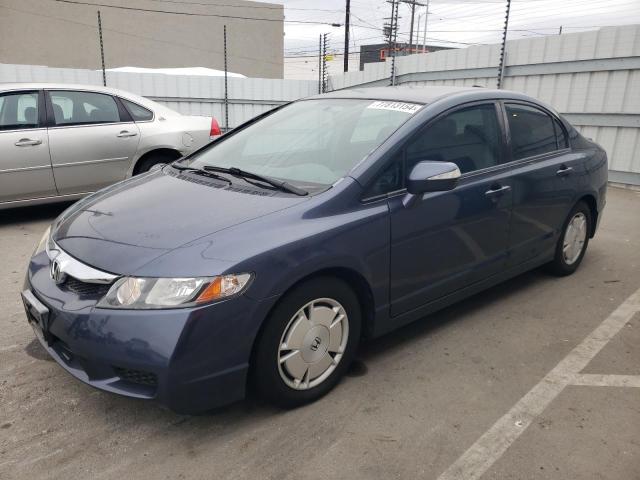 HONDA CIVIC HYBR 2010 with VIN JHMFA3F24AS003179 - Photo from auction