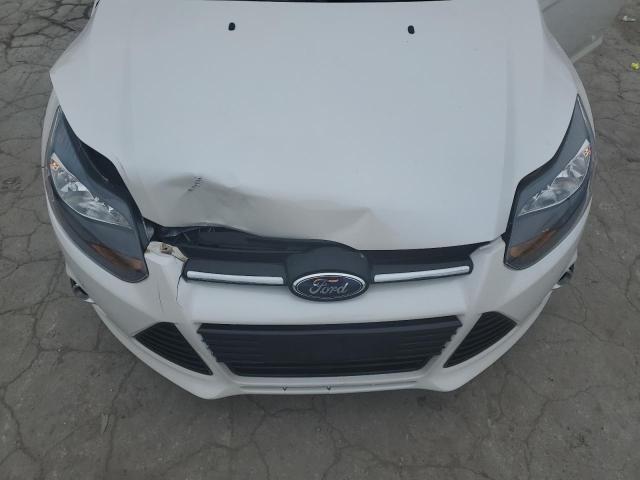 Photo 11 from auction – 2014 FORD FOCUS TITA with VIN 1FADP3N28EL378670
