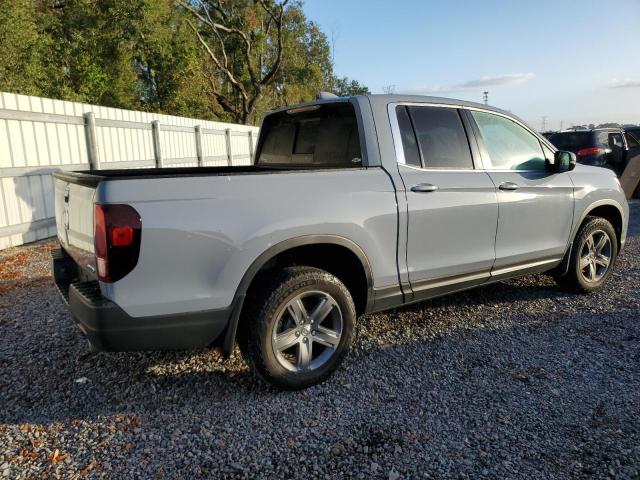 Photo 3 from auction – 2023 HONDA RIDGELINE with VIN 5FPYK3F55PB018305