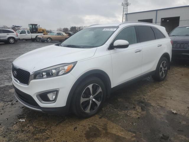 KIA SORENTO EX 2016 with VIN 5XYPH4A58GG084064 - Photo from auction