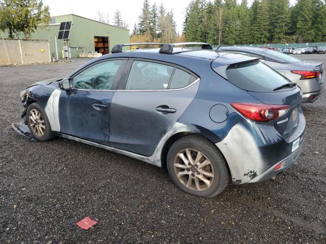 Photo 2 from auction – 2015 MAZDA 3 TOURING with VIN 3MZBM1L70FM211679