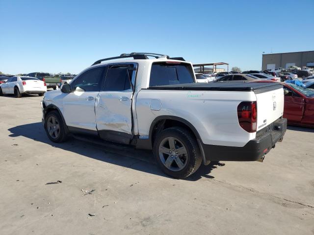 Photo 2 from auction – 2023 HONDA RIDGELINE with VIN 5FPYK3F71PB031909