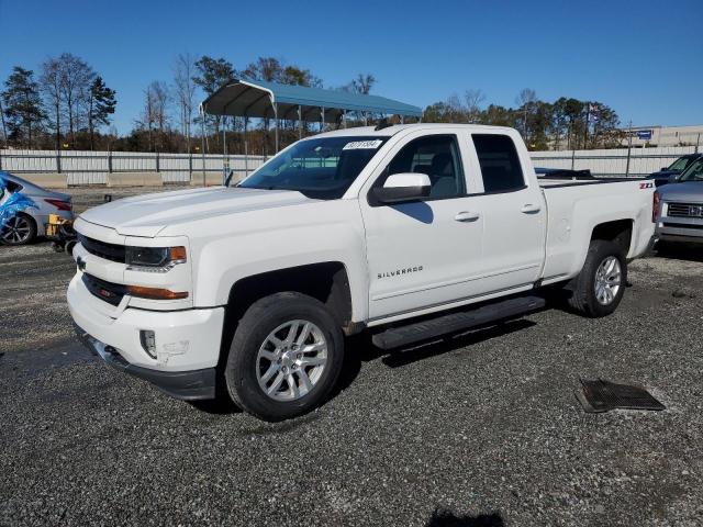 CHEVROLET SILVERADO 2018 with VIN 2GCVKREC3J1112482 - Photo from auction